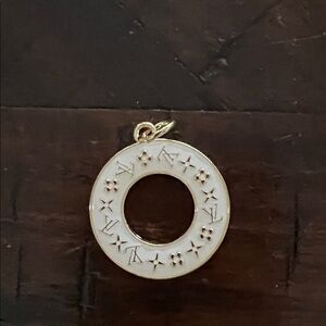 Elegant Louis Vuitton Gold and Cream double sided Donut Pendant